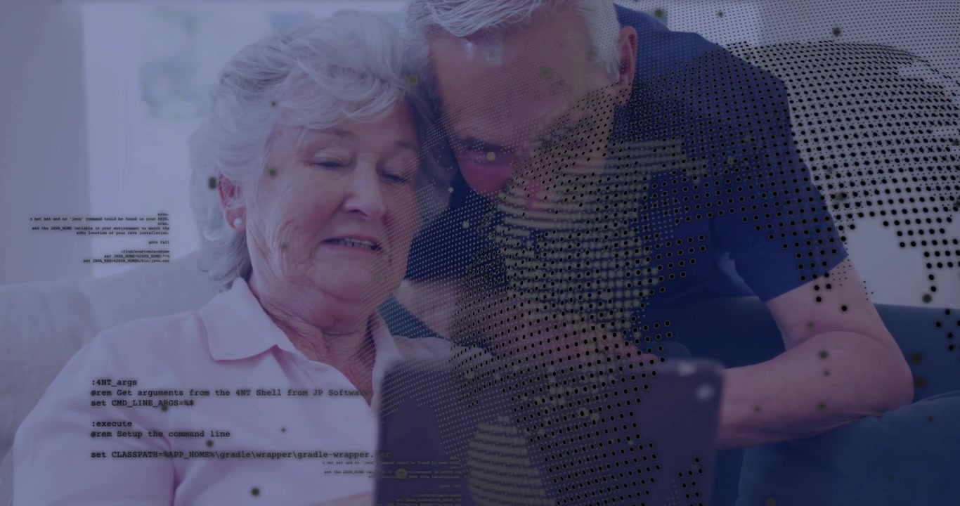 Senior couple sitting on couch tapping tablet display and exploring digital data and world map