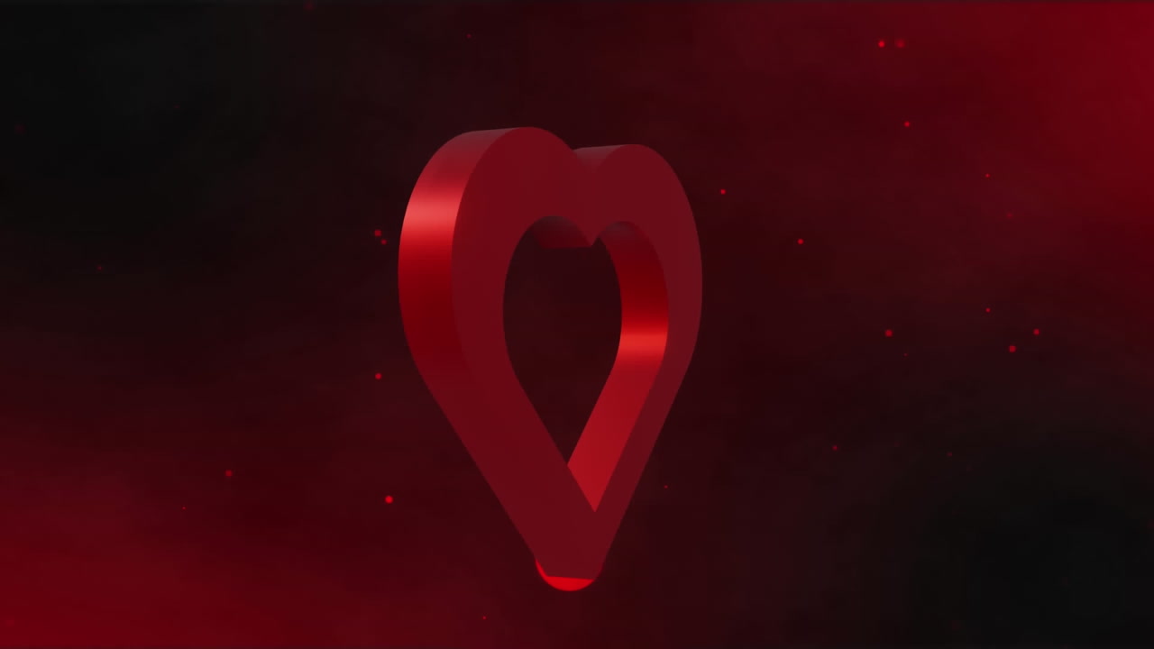 анимация красного сердца, вращающегося на черном фоне