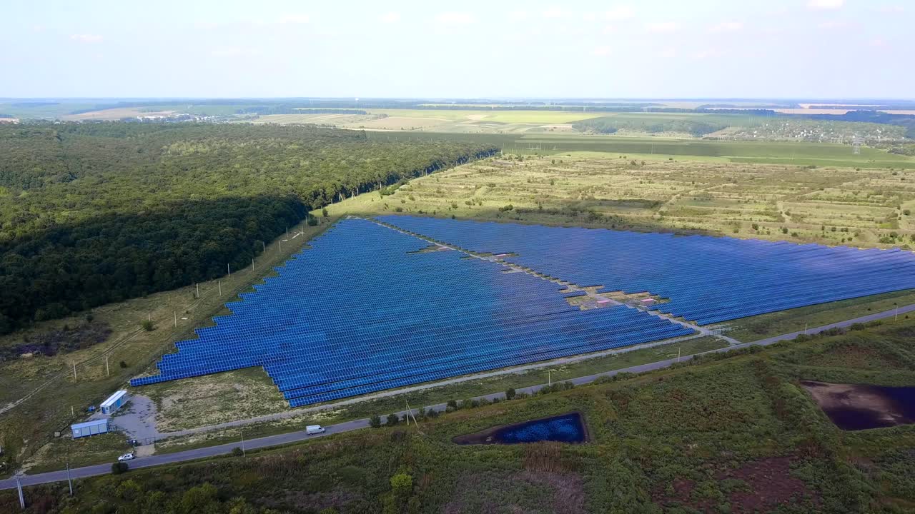 Field Of Solar Panels. Alternative energy creation in a solar park