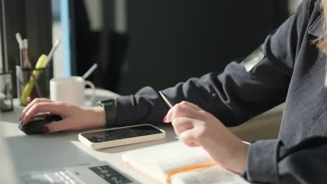 car service manager working at desk in office