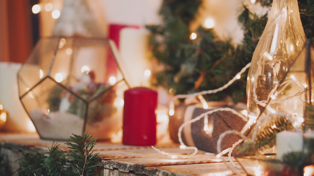 Woman's hands hold christmas or new year decorated gift box.