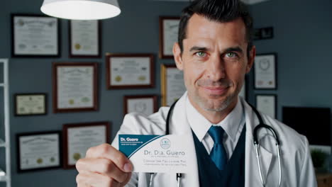 doctor presenting a business card