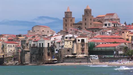 A-city-and-multi-structured-buildings-near-the-ocean-at-day