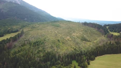 forward panning drone shot over a mountain valley in tatras, slovakia, europe