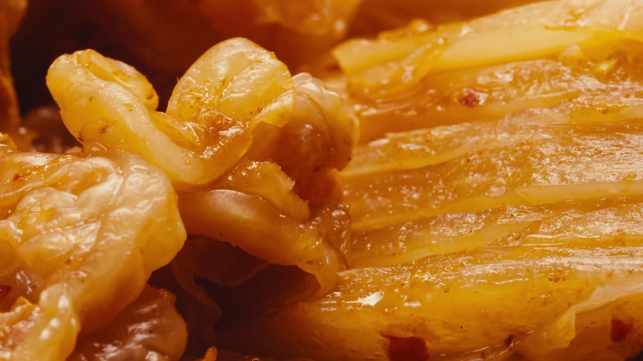 Close-up of texture fermented spicy cabbage kimchi with in can. Preservation of vegetables in glass jars. Fermentation preserved kimchi cabbage with spices macro. Asian cuisine.