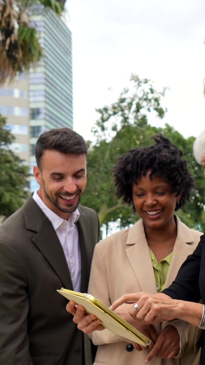 Business people collaborating on a project using a tablet