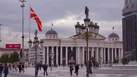 pedestrians walk in downtown skopje macedonia