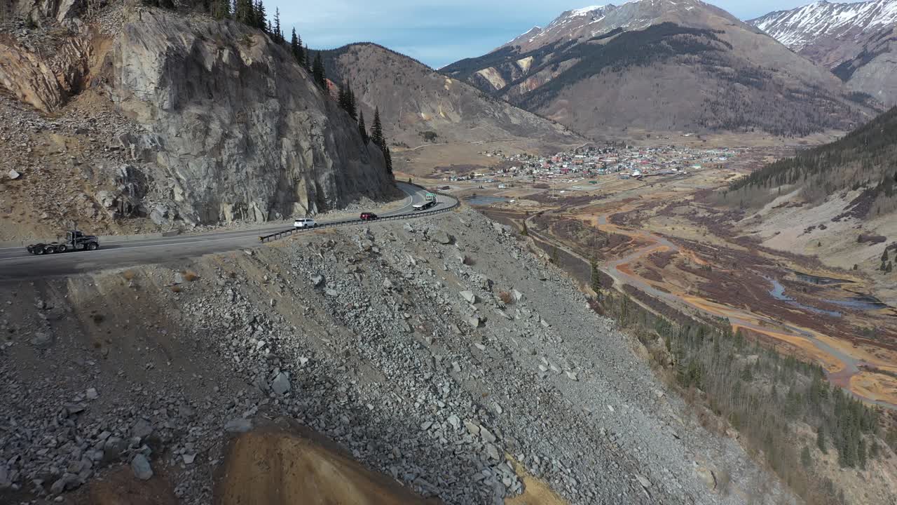 Silverton CO 4K through trees and vehicles