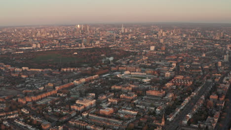 dolly back aerial shot over central west london maida vale at sunset