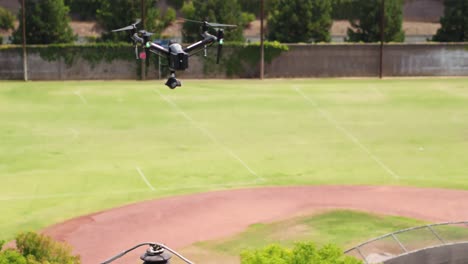 drone inspecting distribution power pole from the air