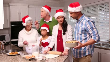 three generation family baking together at christmas time