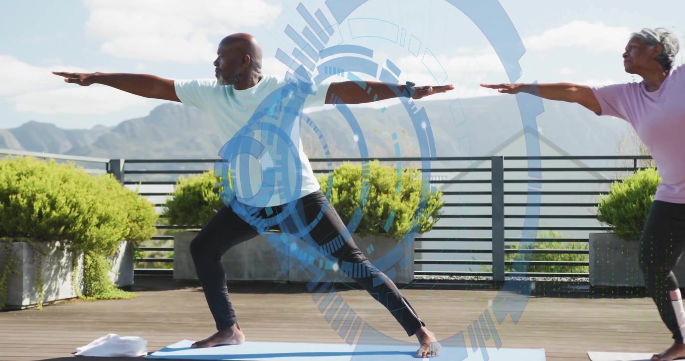 Practicing yoga on rooftop, two people with digital health data animation overlay