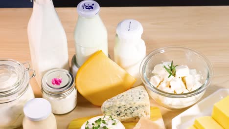 assorted dairy products on a wooden background