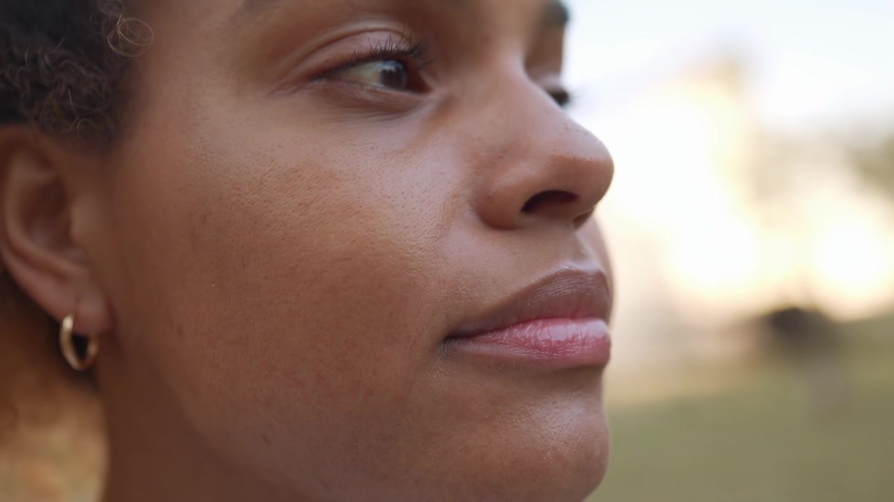 Close-up Profile of a Young Woman's Face in Natural Light
