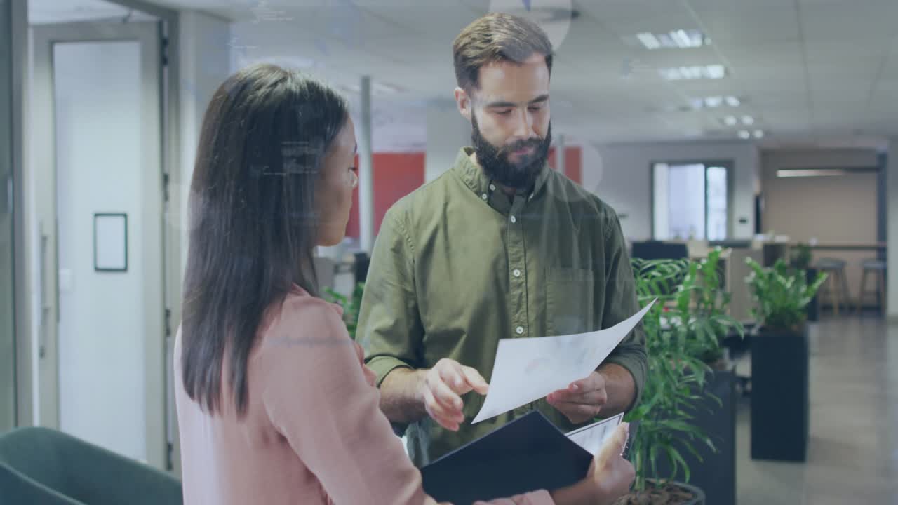 Man pointing sheet, woman leaning reviewing in biz, animated charts linking docs aiding decision