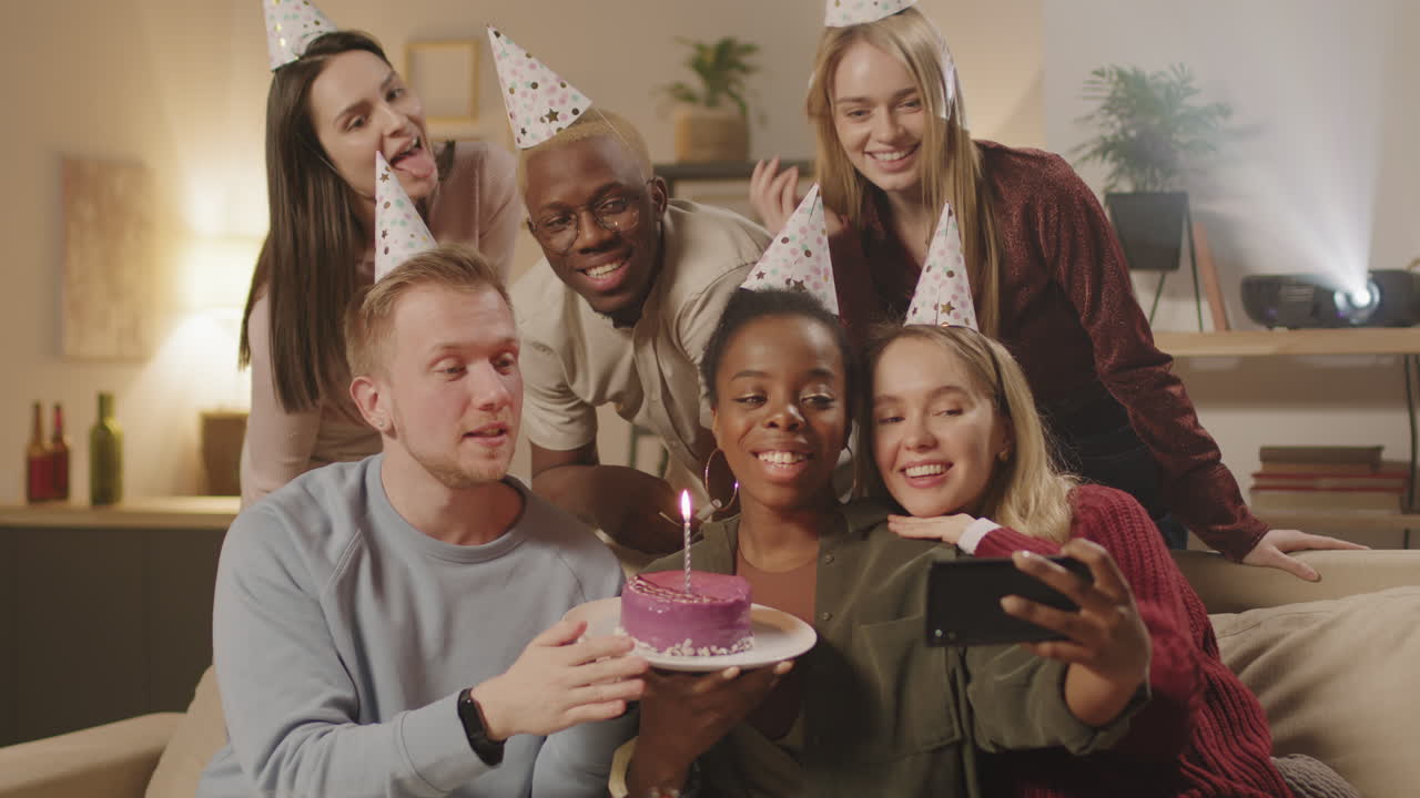 Diverse Group of People Taking Selfie with Birthday Cake