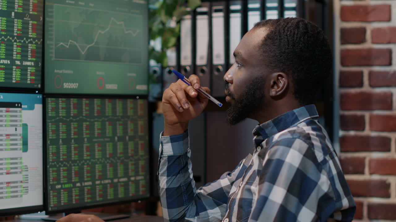 Male investor brainstorming ideas to create stock trading profit