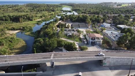 drone footage revealing reserva ecologica municipal estero in san jose del cabo baja california sur mexico, wetlands and forest with the ocean in the distance
