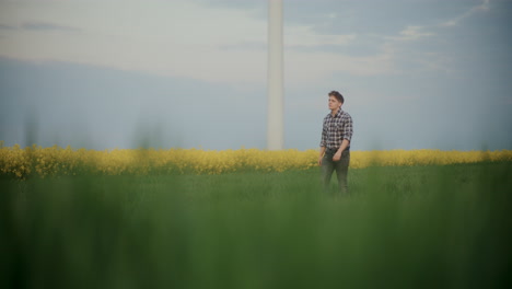 Young-Farmer-Walking-In-Farm