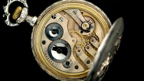 antique pocket watch with open movement