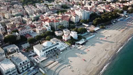 Top-view-during-a-sunset-of-a-village-next-to-the-Mediterranean-sea