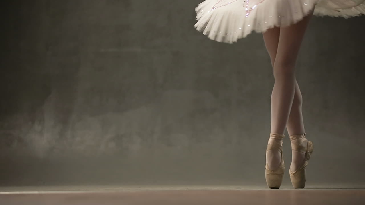 Ballerina Dancing In Studio. Beautiful little girl ballerina dancing in ballet studio