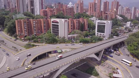 Stunning-aerial-revealing-shot-od-Aguacatala-glorieta-roundabout-in-Medellin,-Colombia