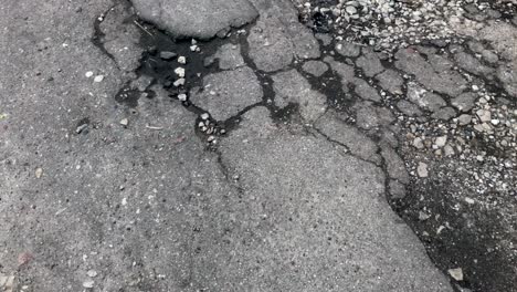 damaged asphalt road