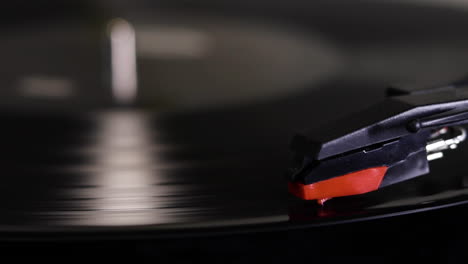 A-close-up-shot-of-a-record-vinyl-spinning-on-a-turn-table