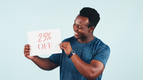 happy man, discount and holding poster in studio