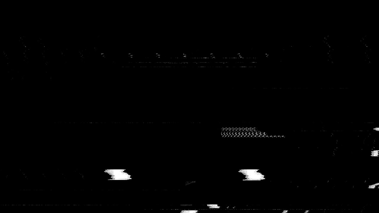 Effetto glitch digitale e rumore statico su sfondo nero