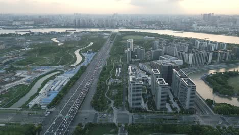 drone fly shanghai china aerial construction site near huangpu river cityscape, huge asian metropolis