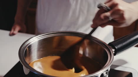 cooking with a wooden spoon