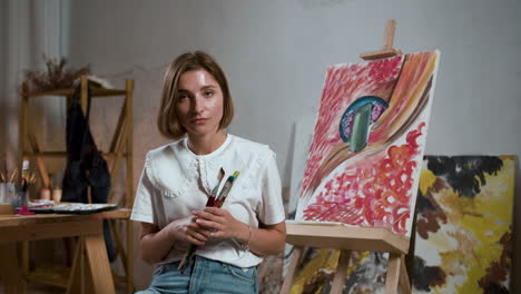 Woman-posing-with-brushes