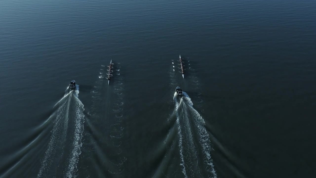Vibrant top aerial shot of rowing competition with quadruple scull's crews