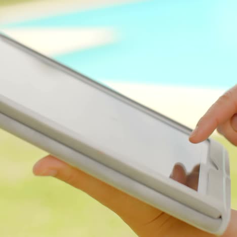 woman working on tablet device