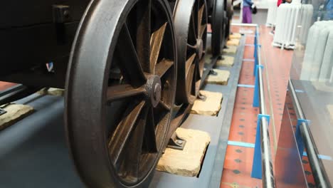 close-up view of train wheels on display