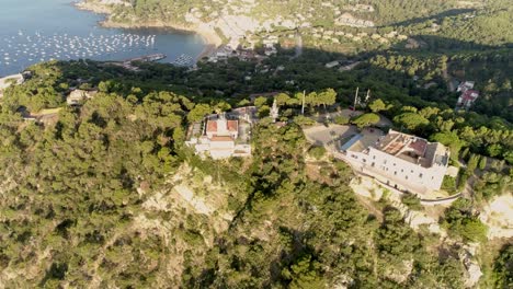 aerial footage of the sunrise from a lighthouse palafrugell, girona, catalonia. recorded with a phantom 4 pro, in 4k at 60 fps.