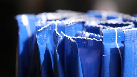 close-up of blue food packets