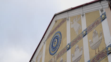 ornate building facade with painted designs