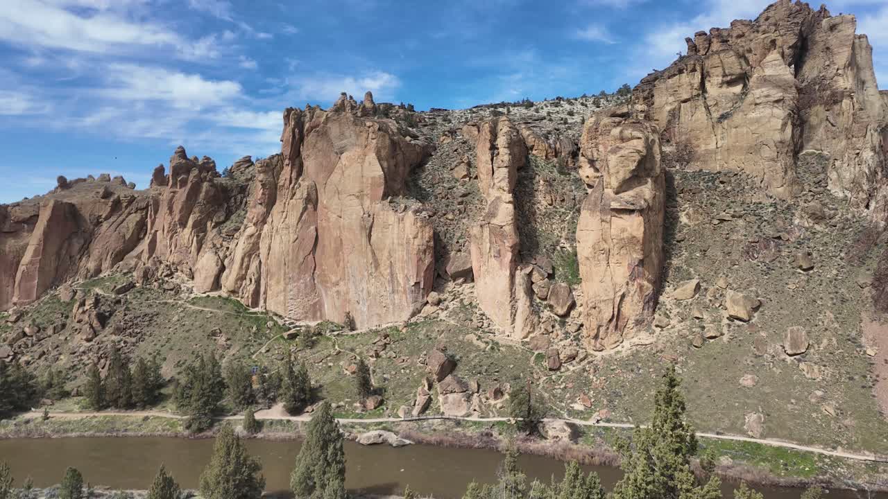 US, Oregon, Terrebonne, Smith Rock, 2025-04-11 - Hyperlapse of rock climbers on the Morning Glory Wall on the mountain with the Crooked River at the bottom. Taken over 30 minutes in the spring.
