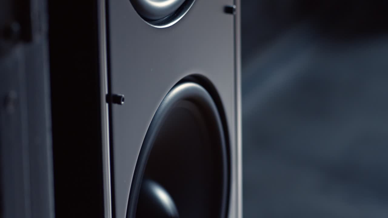 Two Speakers Playing music - pan up