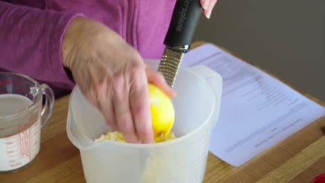 zesting lemon - shaving citrus - baking slow motion