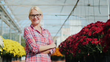 successful woman in a plant nursery