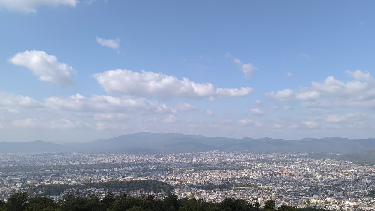Panoramic Aerial fly Mountain Viewpoint city forest in Kyoto Japan Cityscape Fall Colors Autumn from Mount Daimonji