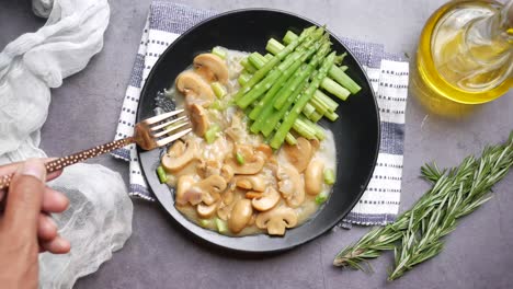 mushroom and asparagus dish with creamy sauce