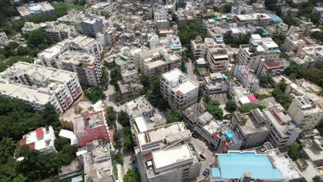 4K-aerial-night-video-of-Banjara-Hills-and-Hill-Top-colony-is-an-urban-commercial-centre-and-one-of-the-most-affluent-neighbourhoods-in-Hyderabad,-Telangana,-India