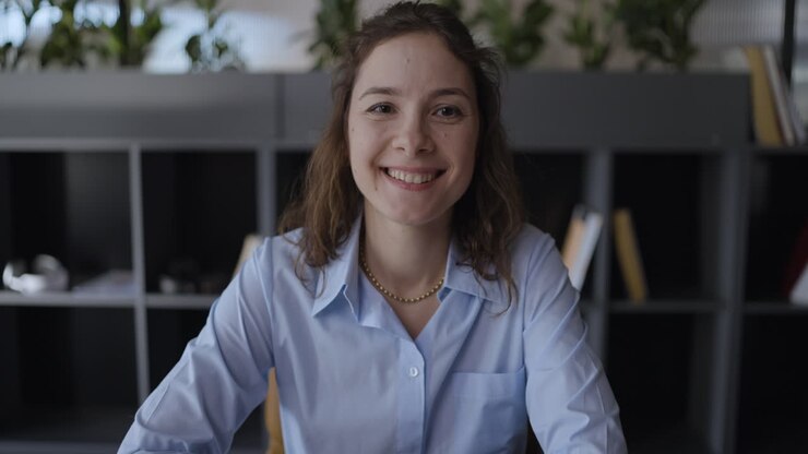 Smiling Woman in Office Setting
