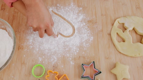 Heart,-flour-and-hands-baking-shape-love-symbol