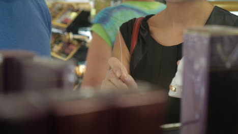 couple choosing the perfume in the shop